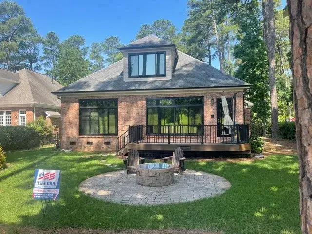 Backyard scene in Norfolk featuring tinted windows for added privacy.